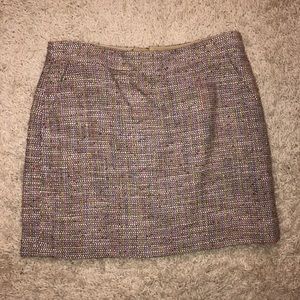 Pink, green, blue, black, and white tweed skirt